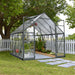 8×8 Balance greenhouse installed in a backyard garden with plants growing inside