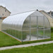 Bella 8x20 bell-shaped greenhouse installed on lawn showing curved roof design
