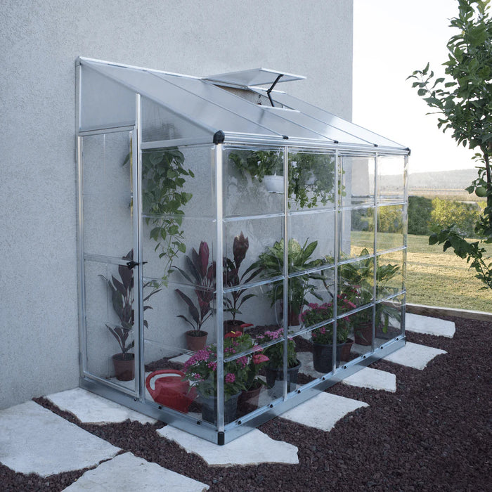 compact 8 x 4 ft lean-to greenhouse with hinged side door, ideal for patios and small outdoor spaces