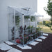 compact 8 x 4 ft lean-to greenhouse with hinged side door, ideal for patios and small outdoor spaces