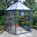 8 ft Oasis hex greenhouse showing wide double hinged doors for easy access