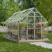 Octave 8 x 12 ft greenhouse installed on a gravel base with clear panels and aluminium frame