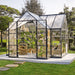 Victory 12 x 10 ft walk-in greenhouse with plants growing inside and double door access