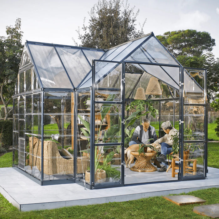 Victory greenhouse interior with tall plants, support beams and bright natural light